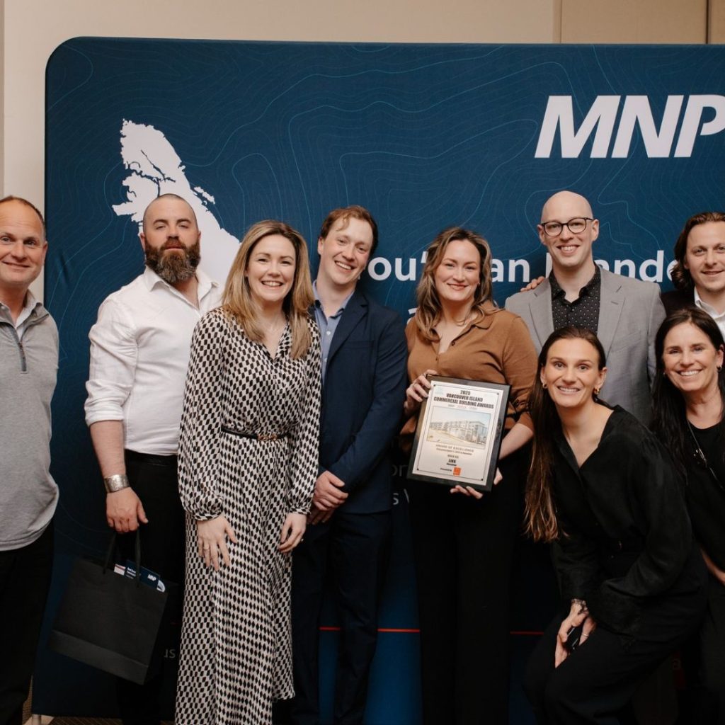 Westmark team poses at 2025 Business Examiner Commercial Building Awards. Winner for Mixed Use Development.